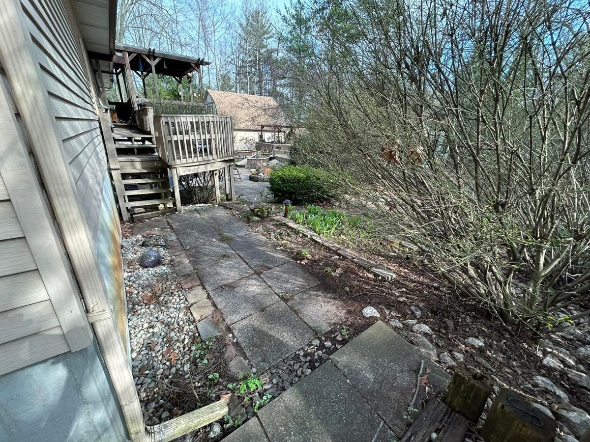 After — paver patio cleaned and cleared