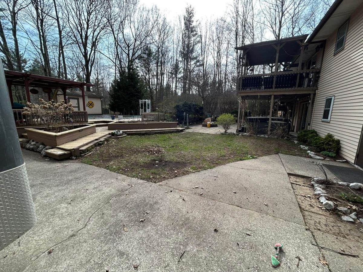 After — deck and backyard lawn cleared