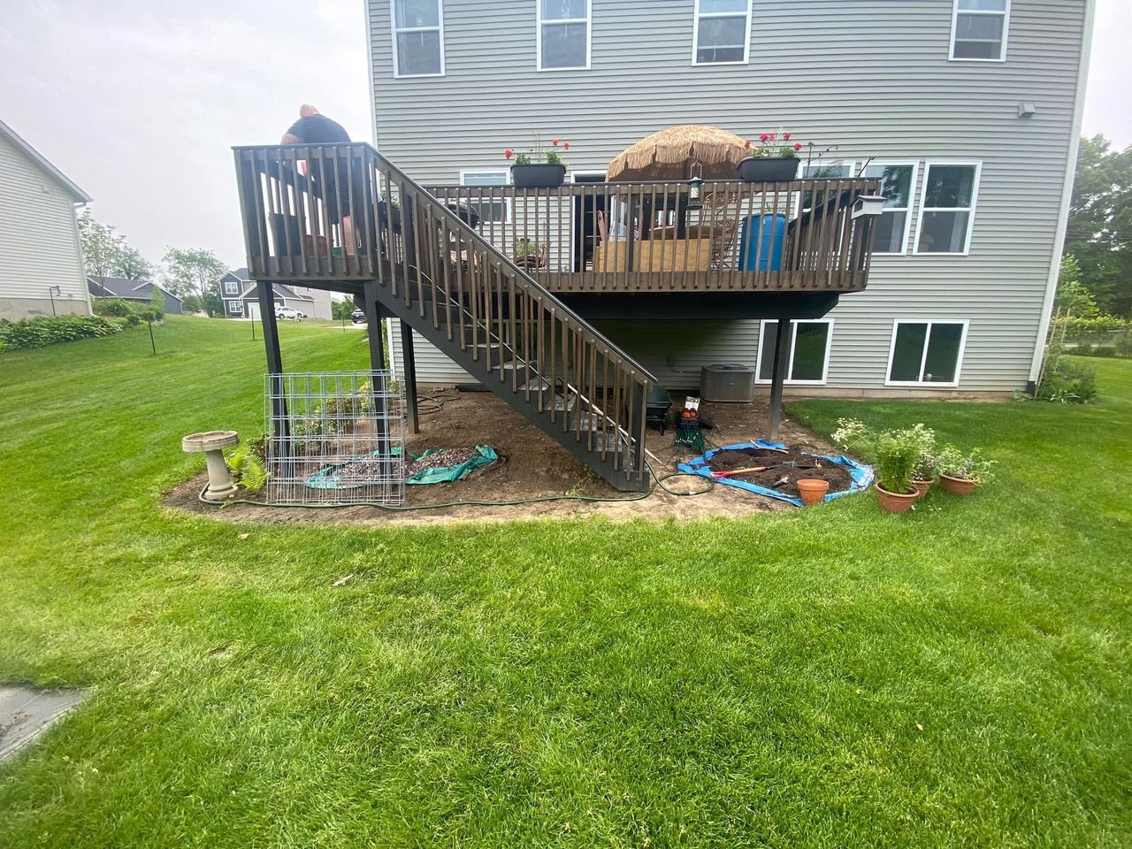 Before — deck and foundation beds before landscaping